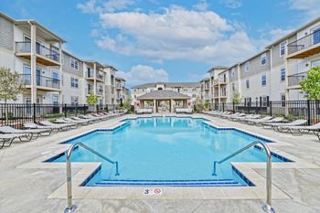 the swimming pool at the preserve at polk apartments